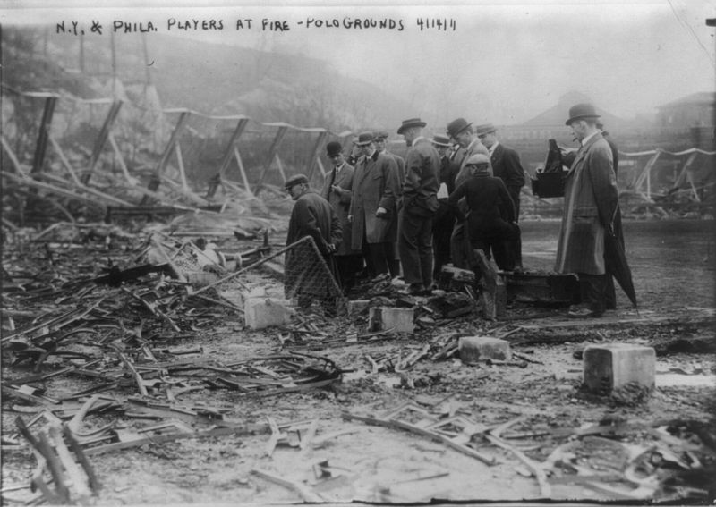 Polo Grounds Fire, April 14, 1911, Giant Players Inspect burned out ruins.